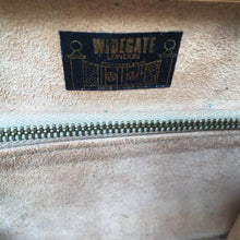 Load image into Gallery viewer, Vintage 50s/60s Handbag In Taupe/ Mushroom Glossy Patent Leather w/ Gilt Bow Detail And A Dainty Gilt Clasp By Widegate-Vintage Handbag, Kelly Bag-Brand Spanking Vintage